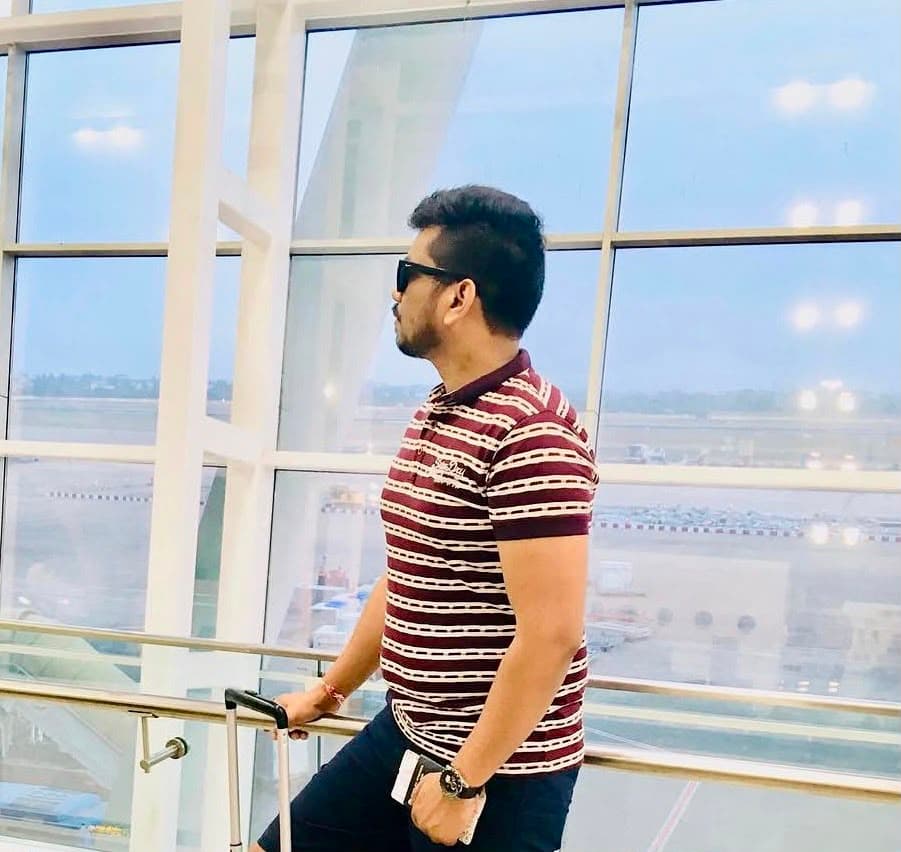 Manas Majhi at an airport overlooking the runway